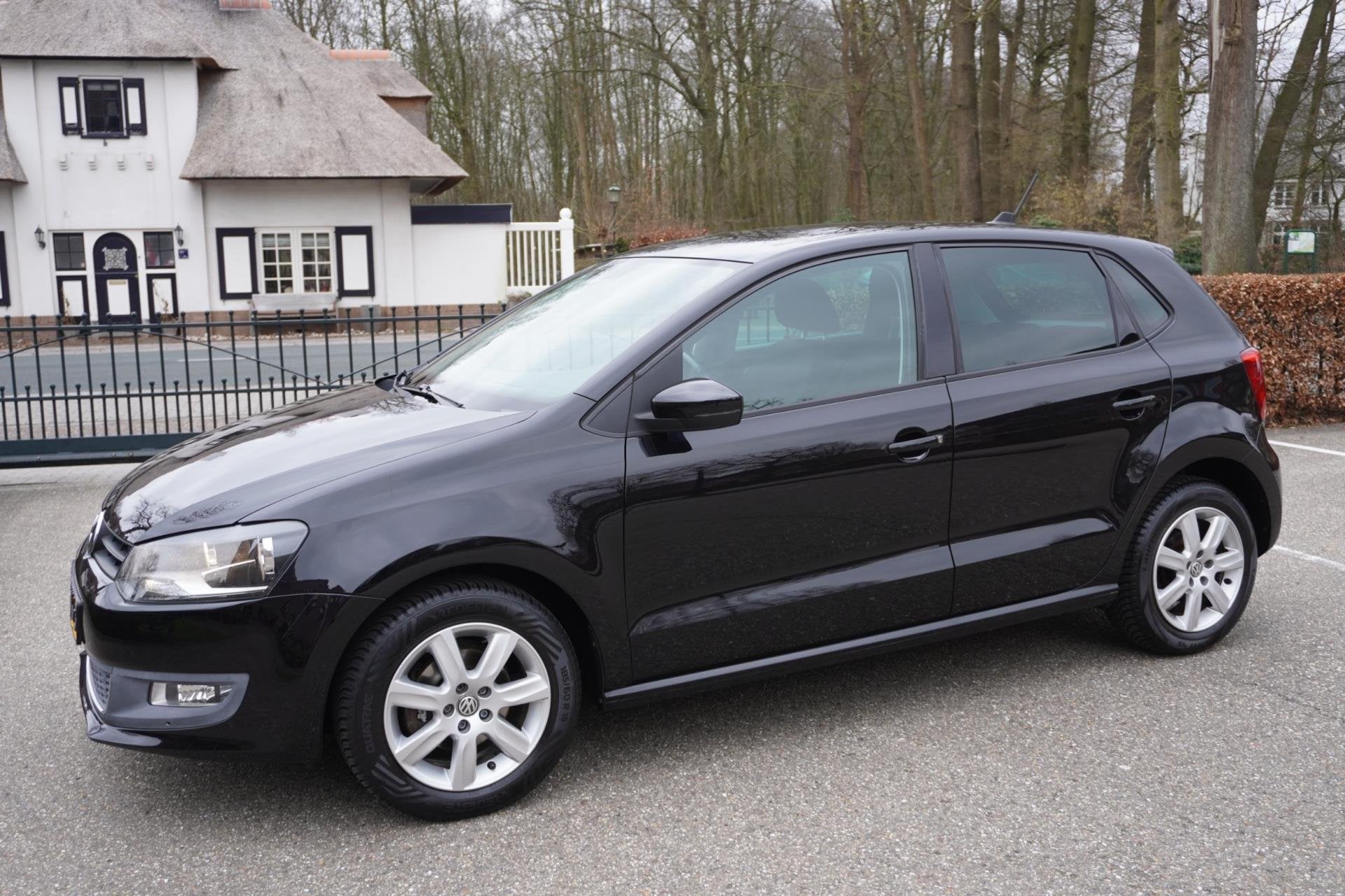 Volkswagen Polo 1.4-16V Highline 5Drs Airco Navi, Auto's, Volkswagen, Voorwielaandrijving, 86 pk, 4 cilinders, Zwart