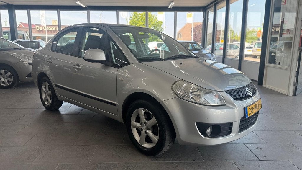 Suzuki SX4 1.6 Comfort automaat 128dzkm nap airco lm-velgen, Auto's, Suzuki, Stof, Gebruikt, Zwart, 4 cilinders