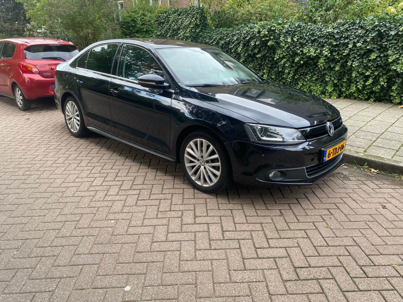 Volkswagen Jetta 1.4 TSI Hybrid 170pk 7-DSG 2013 Zwart, Auto's, Zwart, Origineel Nederlands, 1405 kg, Sedan