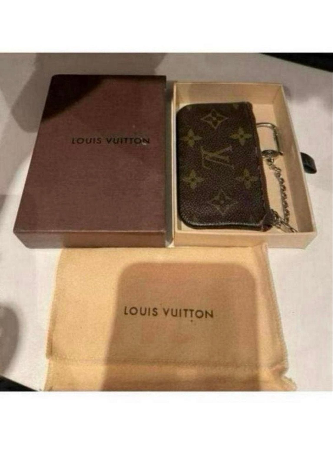 Louis Vuitton Sleutelhanger Portemonnee Origineel, Sieraden, Tassen en Uiterlijk, Portemonnees, Ophalen of Verzenden, Gebruikt