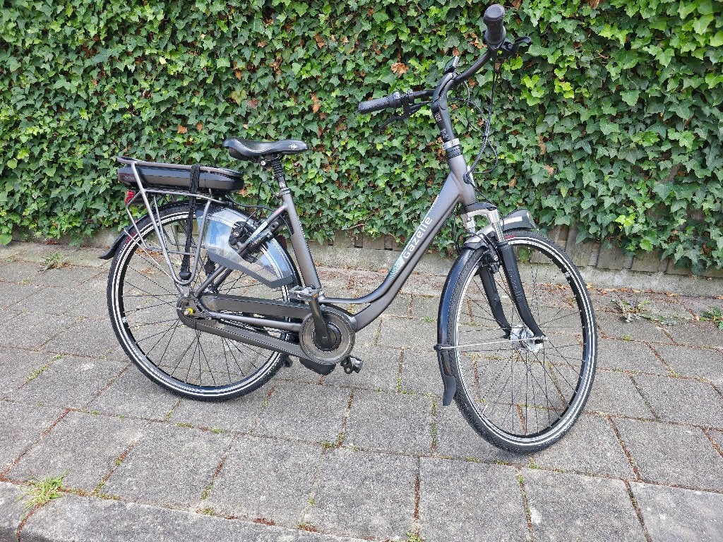 Gazelle orange c8 nieuw uit zient midden motor elektrisch, Ophalen, Sparta, Gebruikt, Velgrem