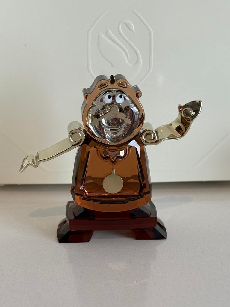 Swarovski disney Beauty And The Beast Cogsworth, Ophalen of Verzenden, Zo goed als nieuw, Figuurtje