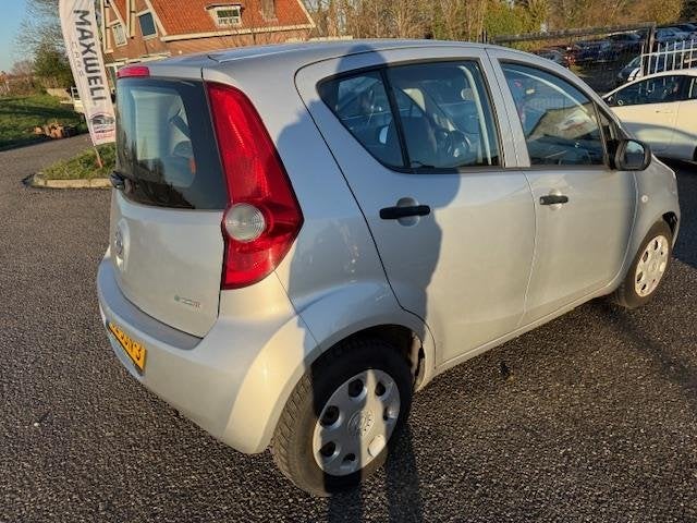 Opel Agila 1.0 Essentia Airco NAP 80xxx KM! APK 1E Eigenaar, Auto's, Gebruikt, 31 €/maand, 996 cc, Origineel Nederlands