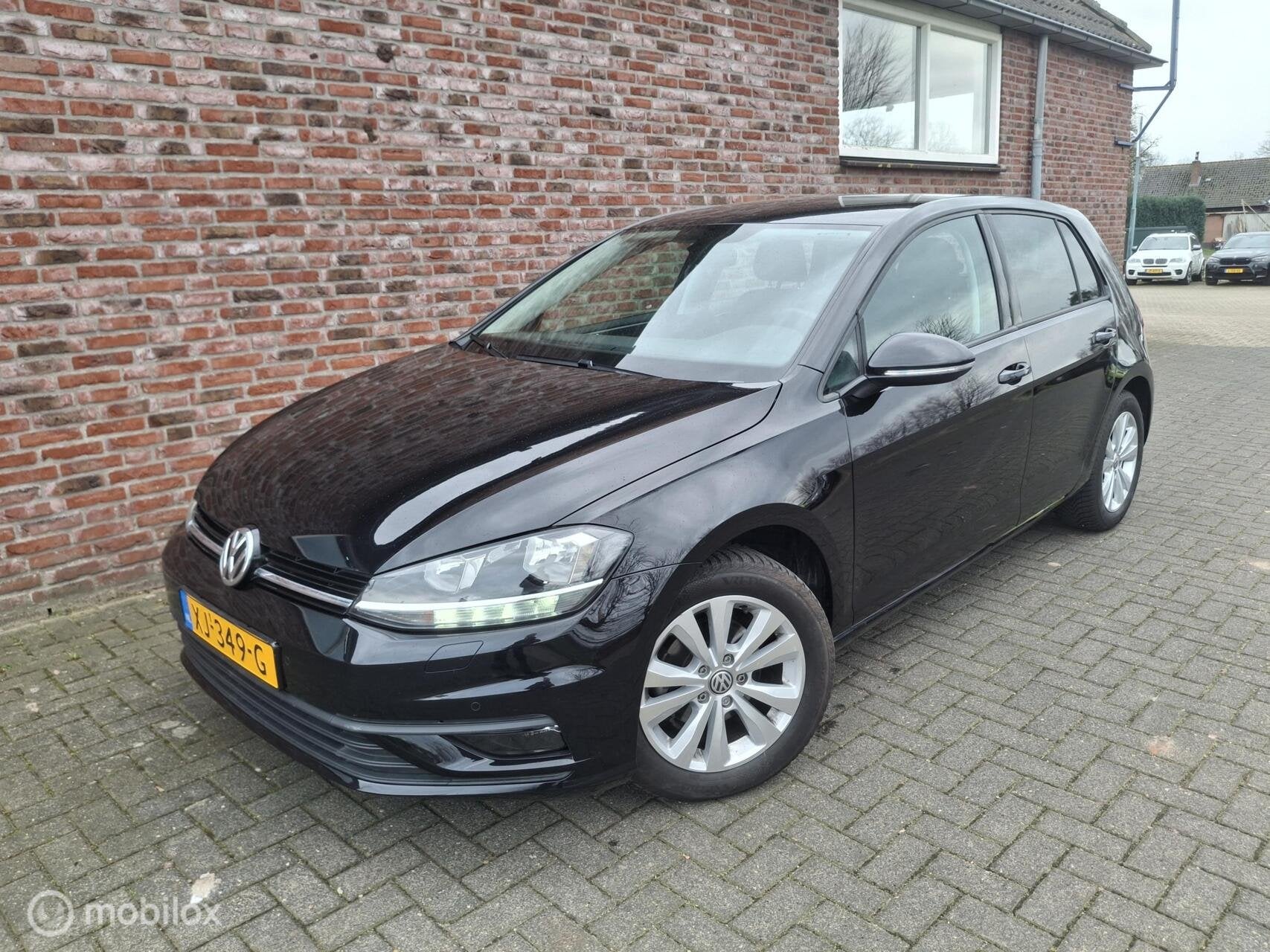 Volkswagen Golf 1.0 TSI Comfortline, Euro 6, Met garantie (alle), Zwart, Origineel Nederlands