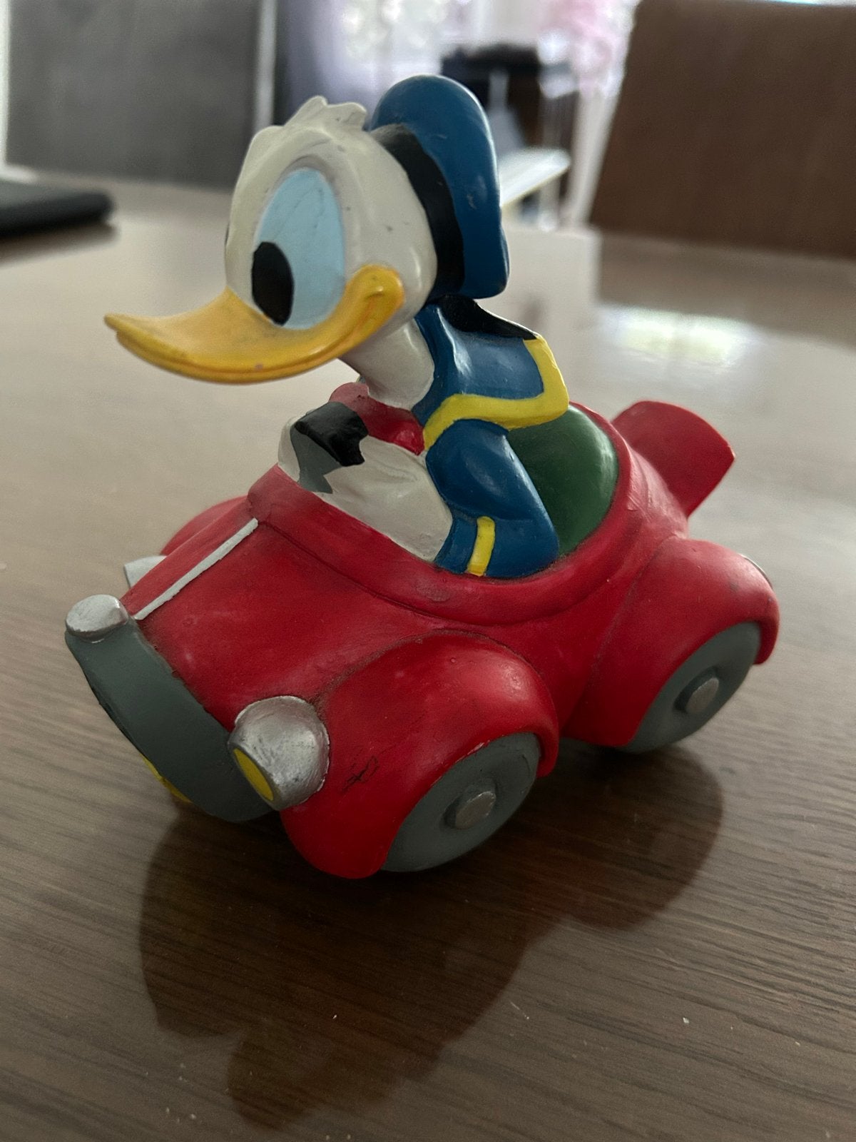 Vintage Donald Duck in auto beeldje - spaarpot, Ophalen of Verzenden, Gebruikt
