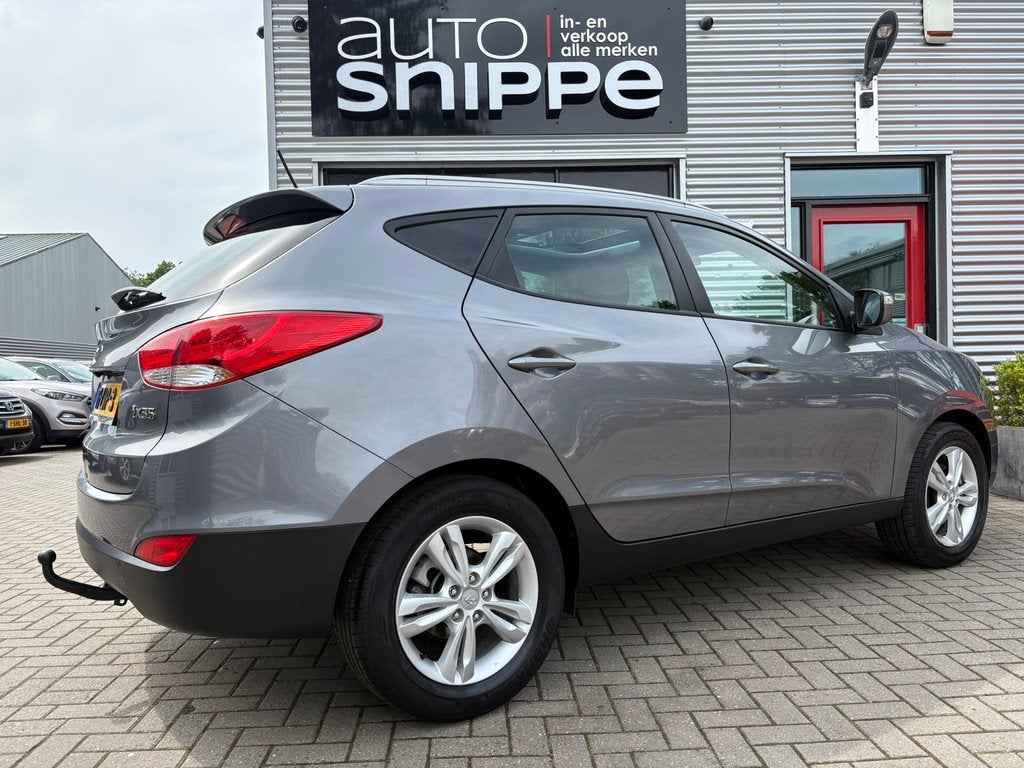 Hyundai Ix35 2.0i Business Edition -AUTOMAAT-CLIMA-CRUISE-OP, Auto's, Hyundai, Gebruikt, Zwart, 4 cilinders, Leder en Stof