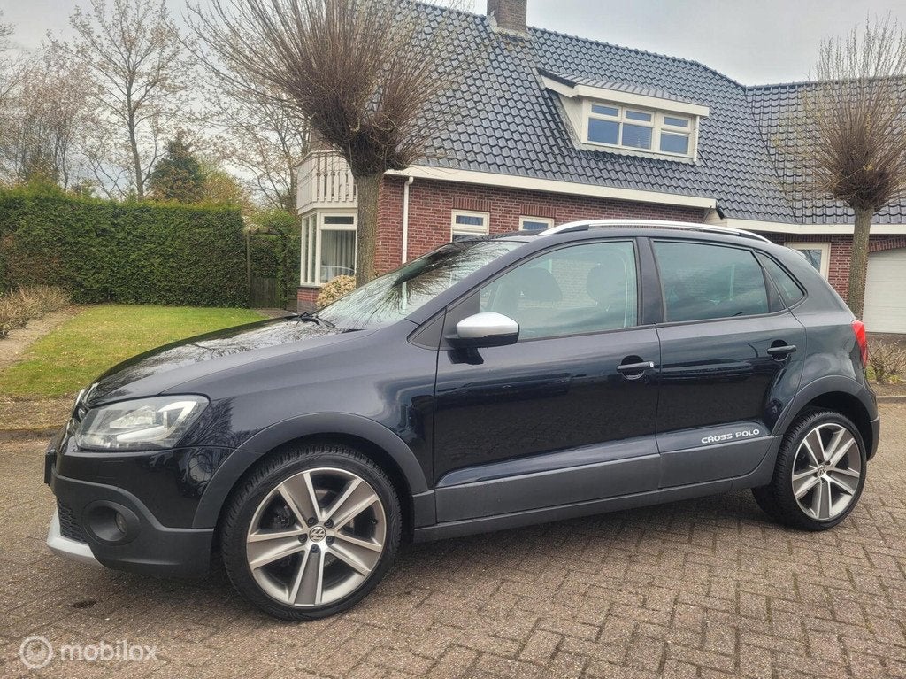 Volkswagen Polo 1.2 TSI Cross clima/navi/lm/pdc/lm., Voorwielaandrijving, Euro 5, Stof, Zwart