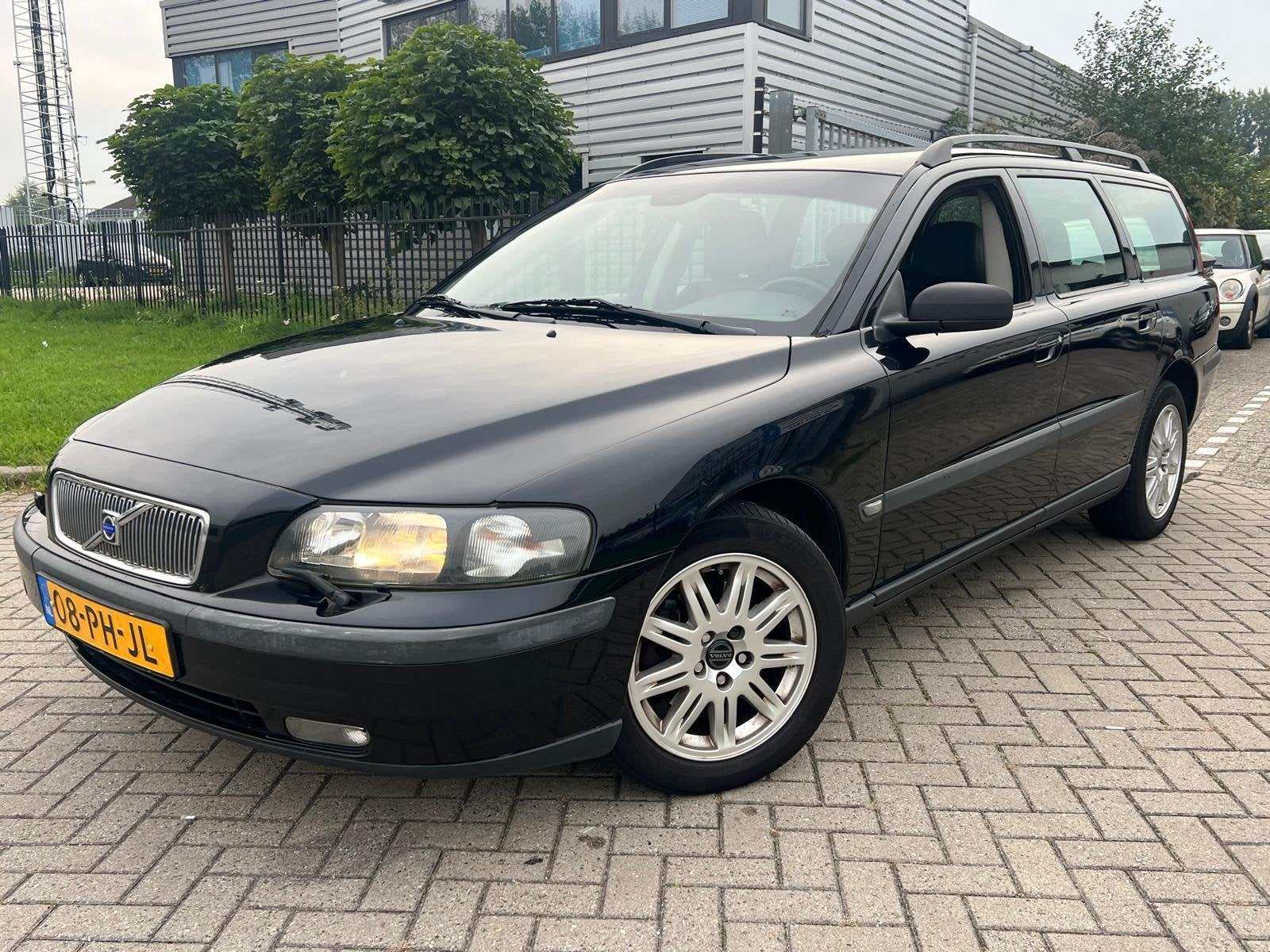 Volvo V70 2.4 Edition II Cruise Clima Trekhaak Zwart, Auto's, Voorwielaandrijving, Stof, Zwart, Verwarmde buitenspiegels