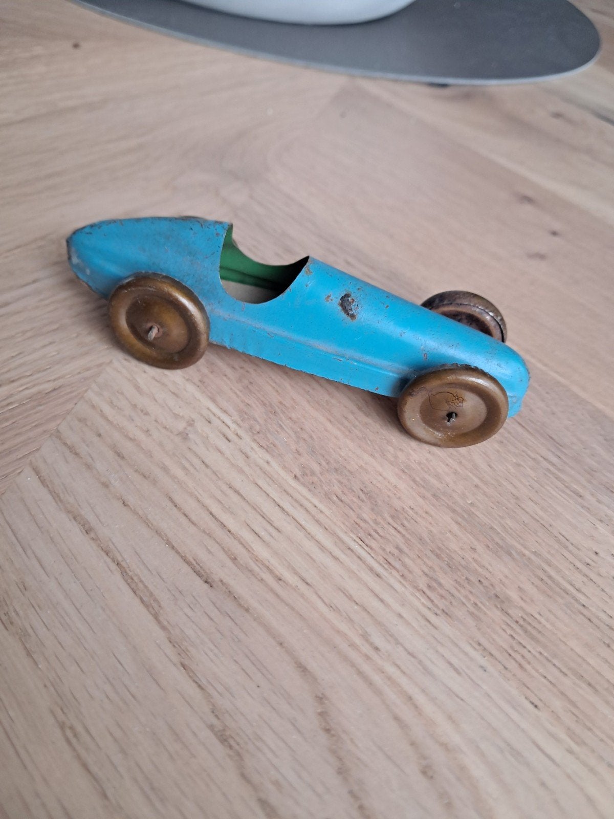 blikken race auto, Ophalen