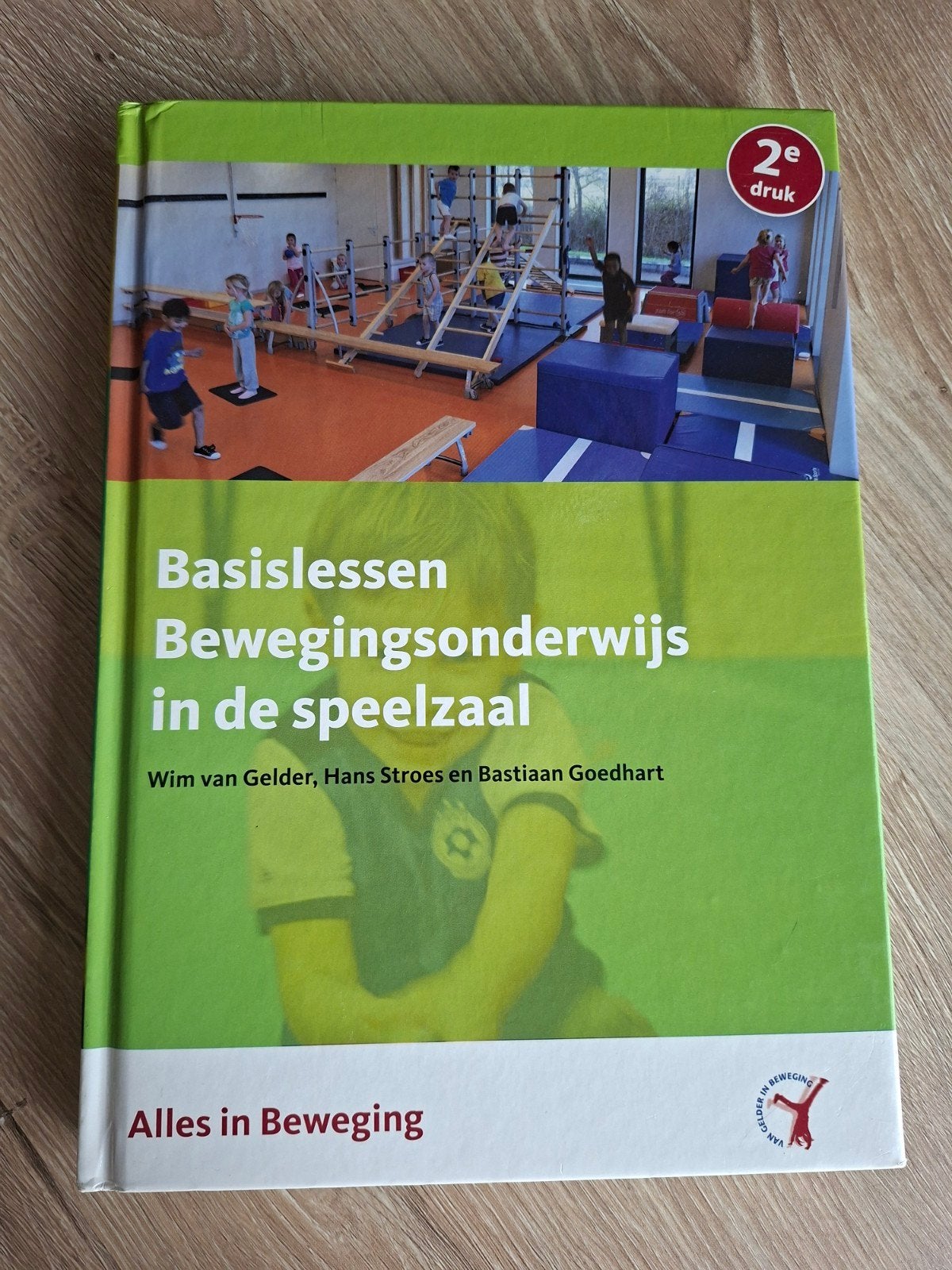 Basislessen bewegingsonderwijs in de speelzaal - kleutergym, Boeken, Ophalen of Verzenden, Zo goed als nieuw, HBO