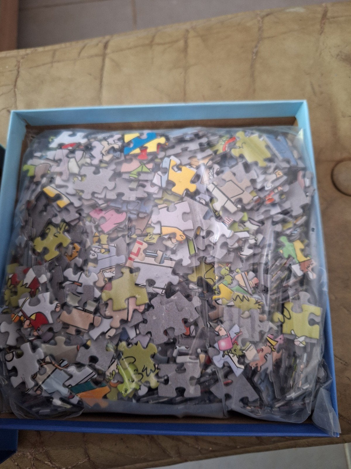 That's life puzzel dorpsplein 1000 stukjes, Ophalen of Verzenden, 500 t/m 1500 stukjes, Zo goed als nieuw, Legpuzzel