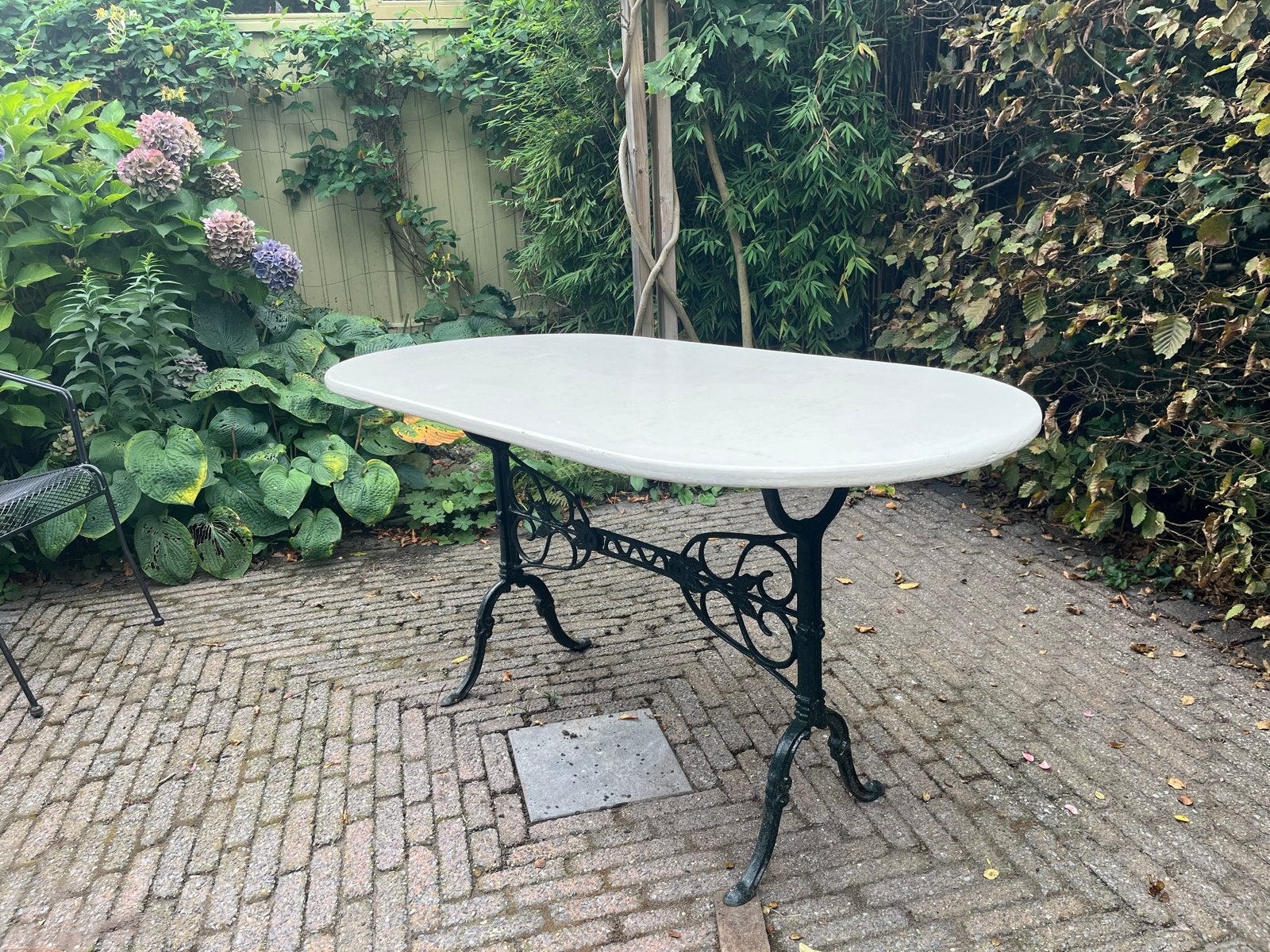 Ovale tuintafel met smeedijzeren onderstel, Ophalen, Gebruikt, Ovaal, Metaal