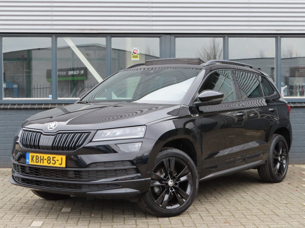 Skoda Karoq 1.5 TSI ACT Sportline Business DSG | pano dak |, Auto's, Skoda, 12 maanden, Stof, 4 cilinders, Zwart