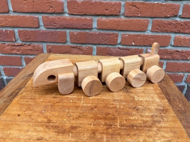 Vintage houten teckel. 17 stuks., Ophalen of Verzenden, Nieuw, Duw- of Trekspeelgoed