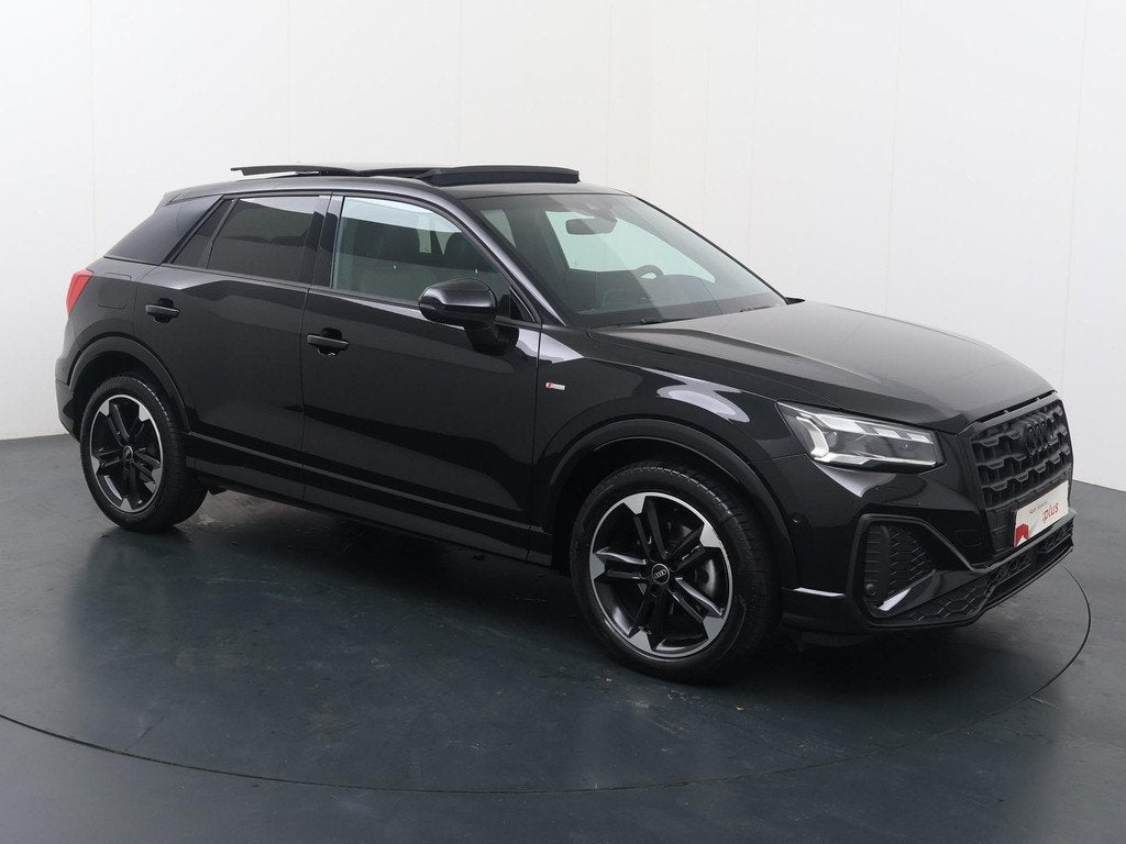 Audi Q2 35 TFSI S Edition | 150 PK | Automaat | Trekhaak | P, Auto's, Audi, 4 cilinders, Leder en Stof, Zwart, Origineel Nederlands