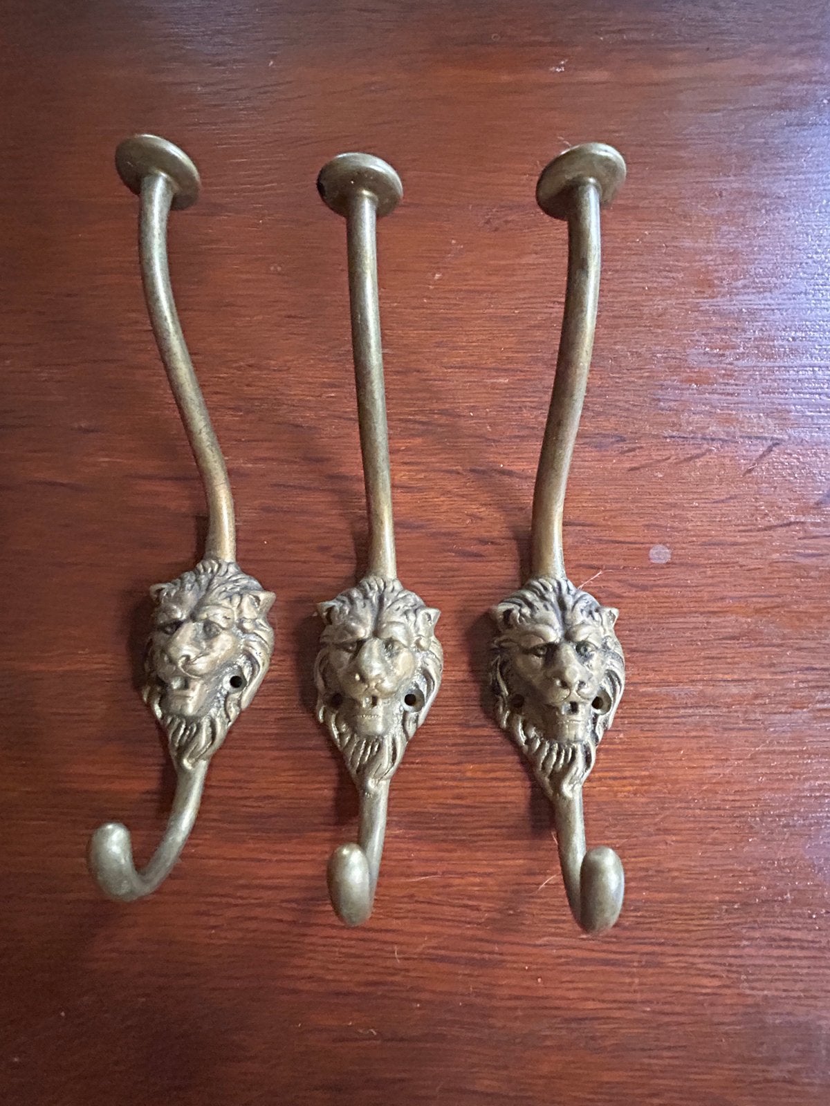 Set van 3 antieke messing kapstokhaken met leeuwenkop, Gebruikt, Wandhaken, Ophalen of Verzenden, Minder dan 100 cm