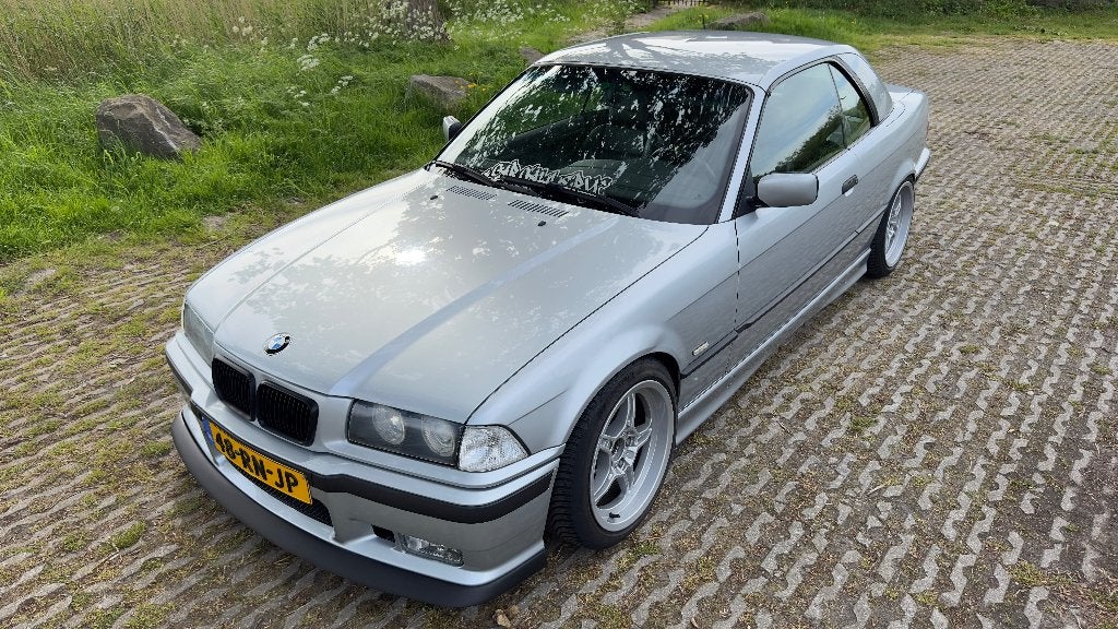 BMW E36 328i Cabrio Handgeschakeld 1997, Auto's, BMW, Euro 2, Achterwielaandrijving, 1440 kg, Zwart