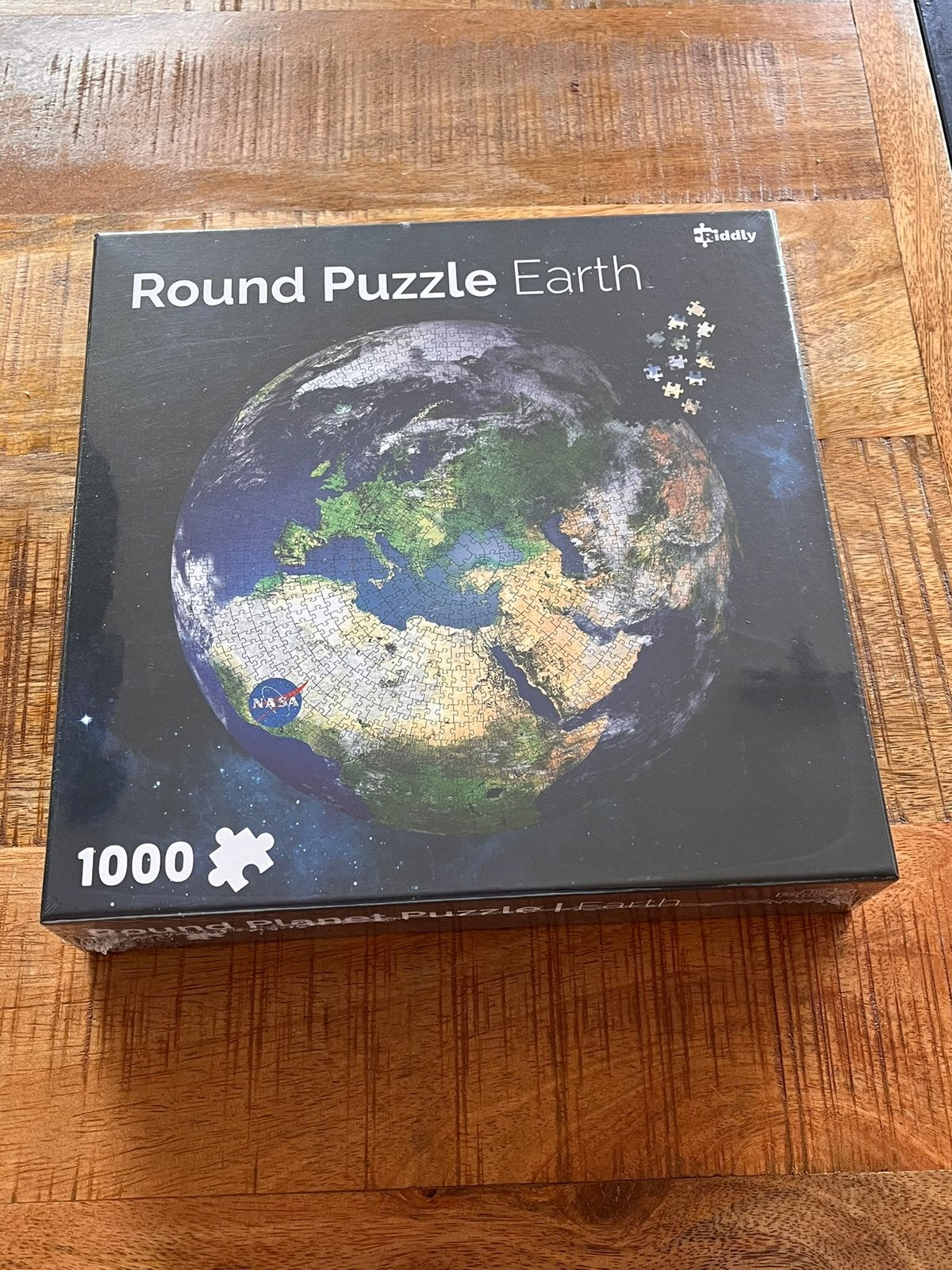 NASA ronde puzzels 5x, Ophalen of Verzenden, 500 t/m 1500 stukjes, Zo goed als nieuw