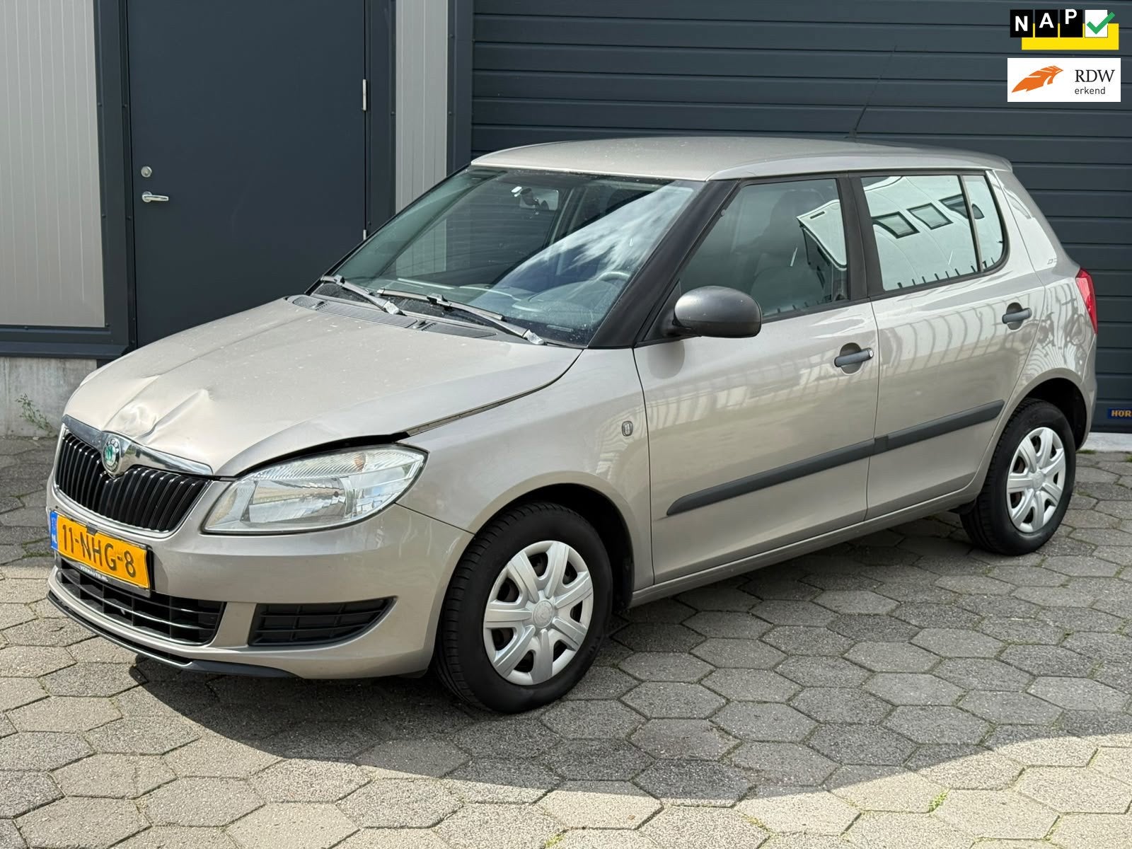 Skoda Fabia 1.2 Comfort 125DKM NAP (Lichte Schade), Auto's, Voorwielaandrijving, Euro 5, Stof, Zwart