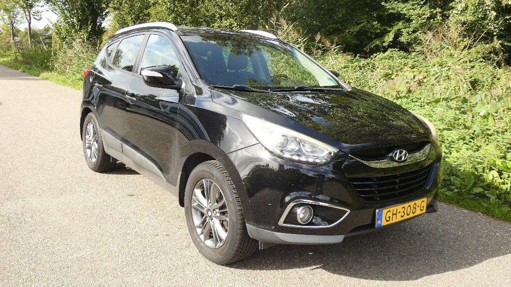 Hyundai iX35 1.6 GDI Go! 2WD 2015 Zwart + 10 maanden BOVAG, Auto's, Voorwielaandrijving, Dealer onderhouden, 1280 kg, 4 cilinders
