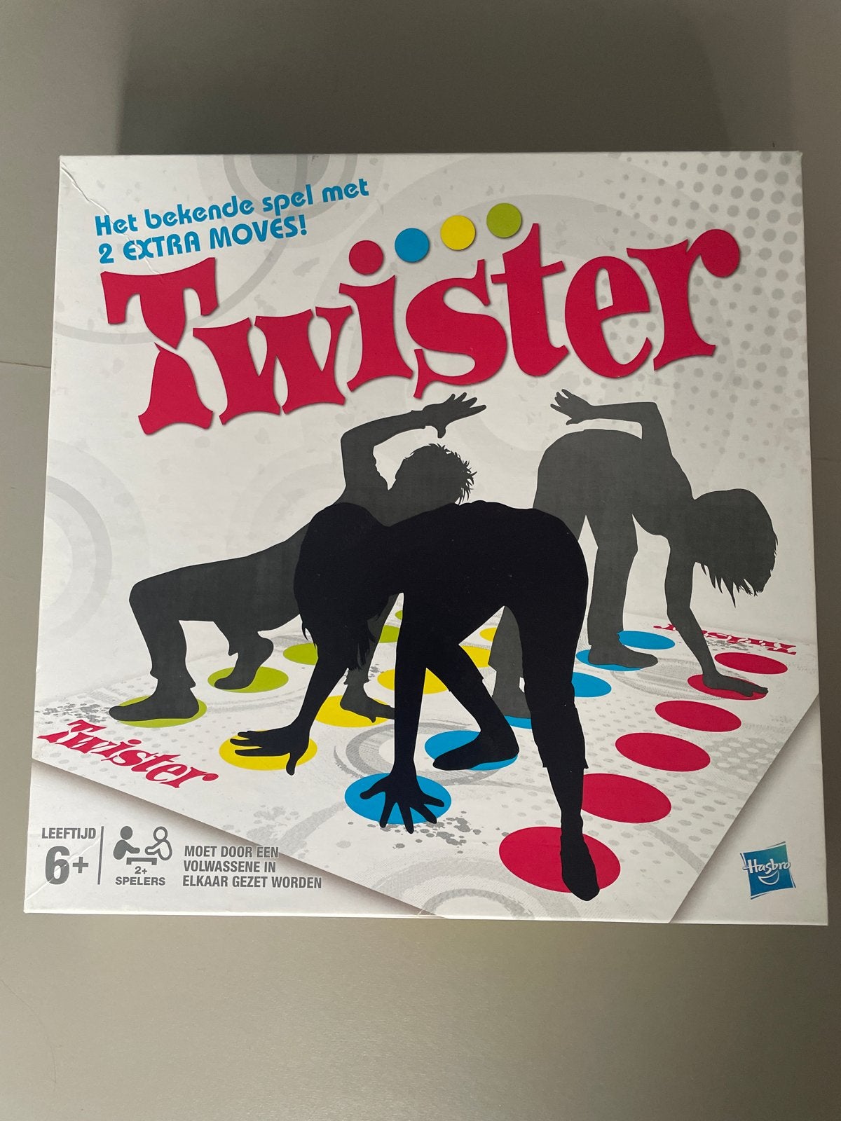Twister: Het bekende spel met 2 extra moves!, Hobby en Vrije tijd, Een of twee spelers, Ophalen of Verzenden, Gebruikt