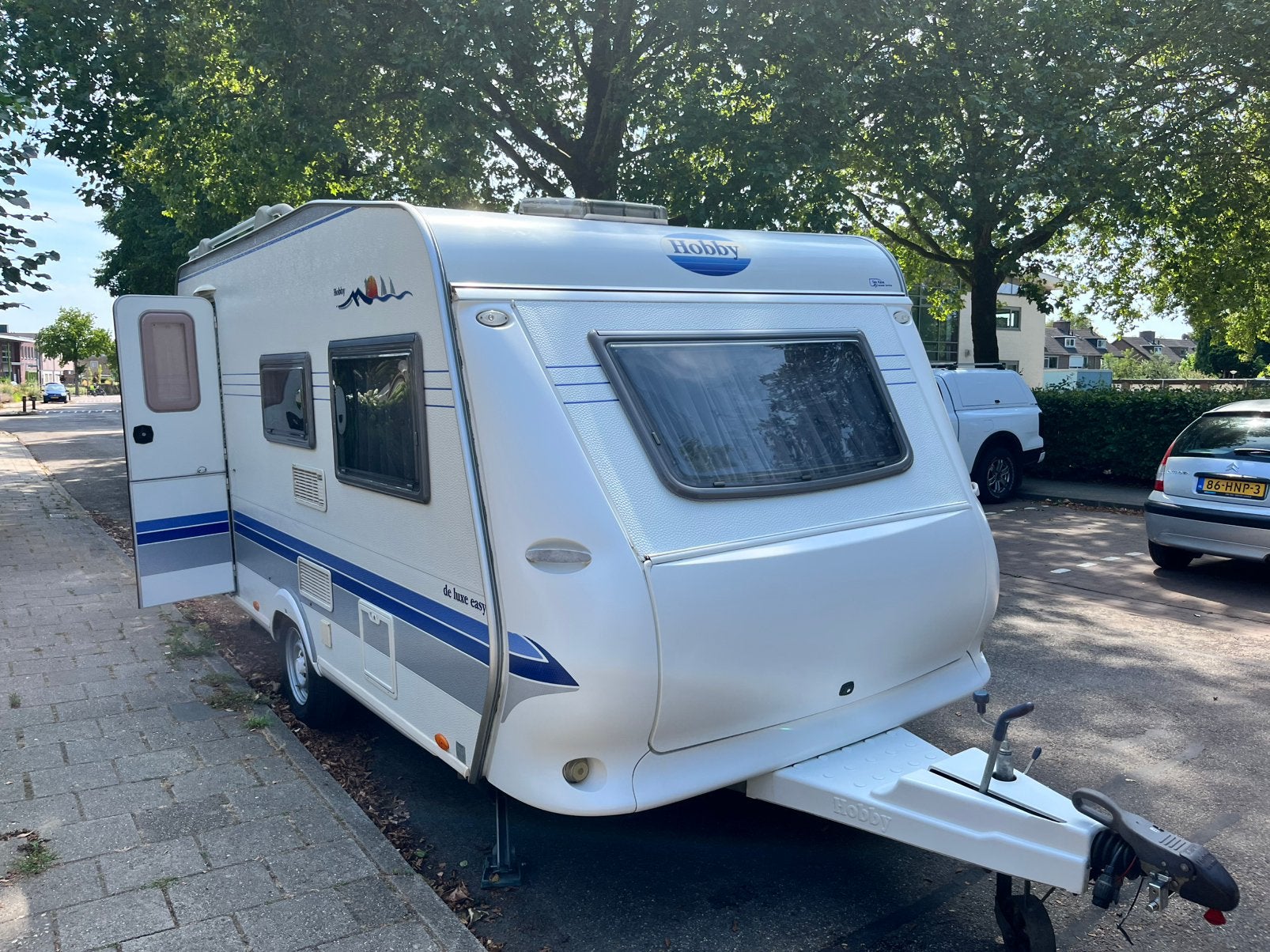 Hobby 440 SF de luxe easy , 2005 , vakantie klaar!, Caravans en Kamperen, Caravans, Hobby, Treinzit, Dwarsbed, Particulier