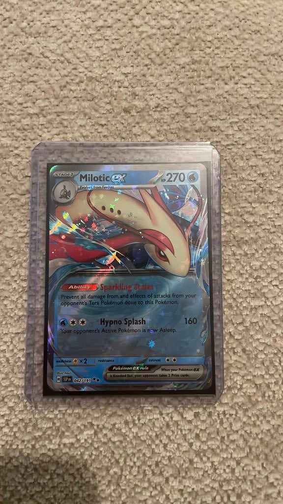 Milotic ex 042/191 Surging Sparks / Ruilen, Ophalen of Verzenden, Nieuw, Losse kaart, Foil