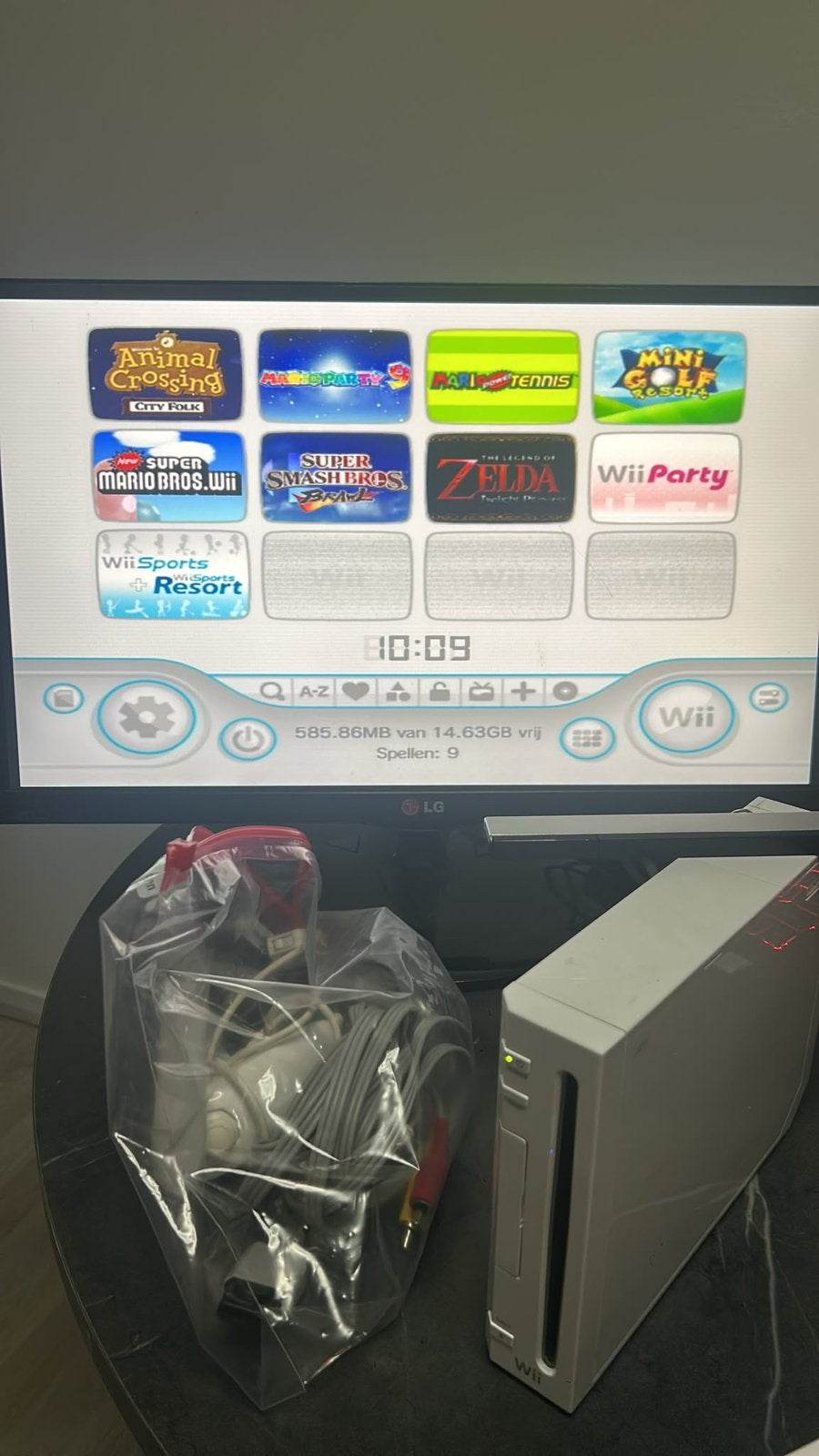 Complete Wii-console met 9 spellen en accessoires, Ophalen, Gebruikt, Met 1 controller, Met games
