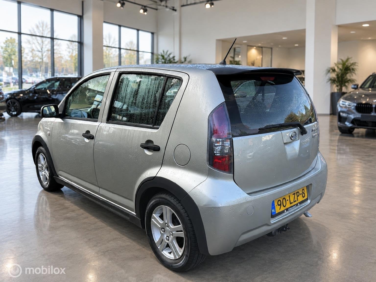 Daihatsu Sirion 2 1.0-12V Premium, Auto's, Voorwielaandrijving, Gebruikt, Beige, Bedrijf