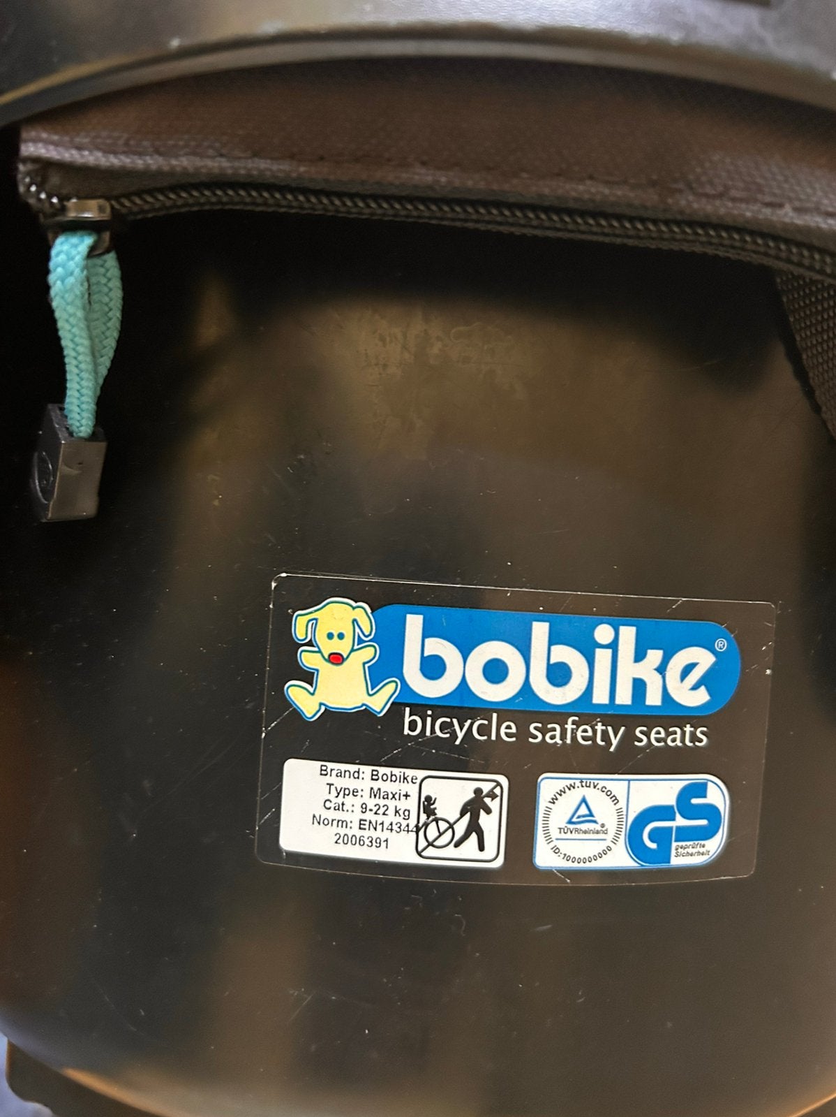 Bobike fietsstoeltje achter., Ophalen