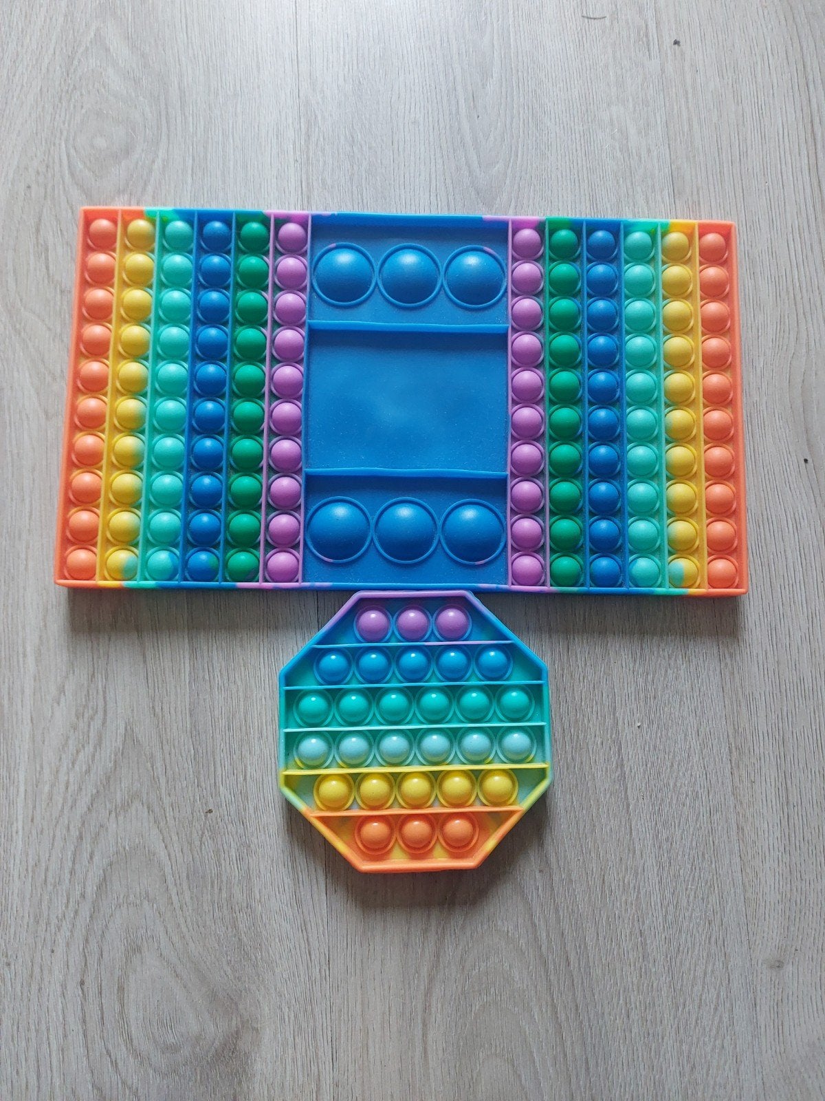 Grote en kleine regenboog Pop It set, Ophalen