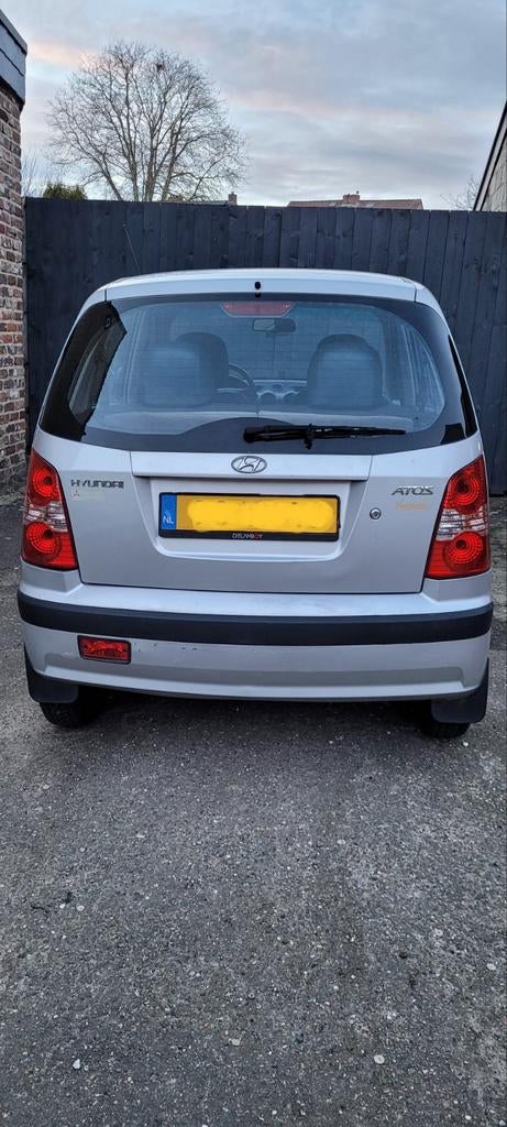 Hyundai Atos 1.1 2007 Grijs, Auto's, Voorwielaandrijving, 31 €/maand, 4 cilinders, Origineel Nederlands