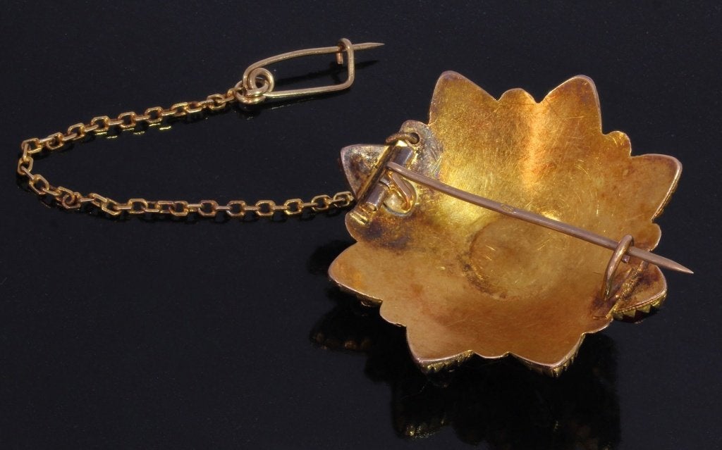 Friesland antieke 14k gouden ster broche granaat paste dames, Verzenden, Goud, Broche, Met edelsteen