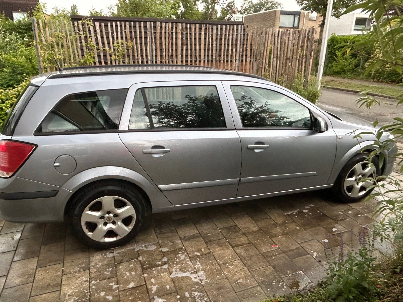Opel Astra 1.6 16V St.wgn. 2006 Grijs, Auto's, Voorwielaandrijving, 15 km/l, 4 cilinders, Origineel Nederlands