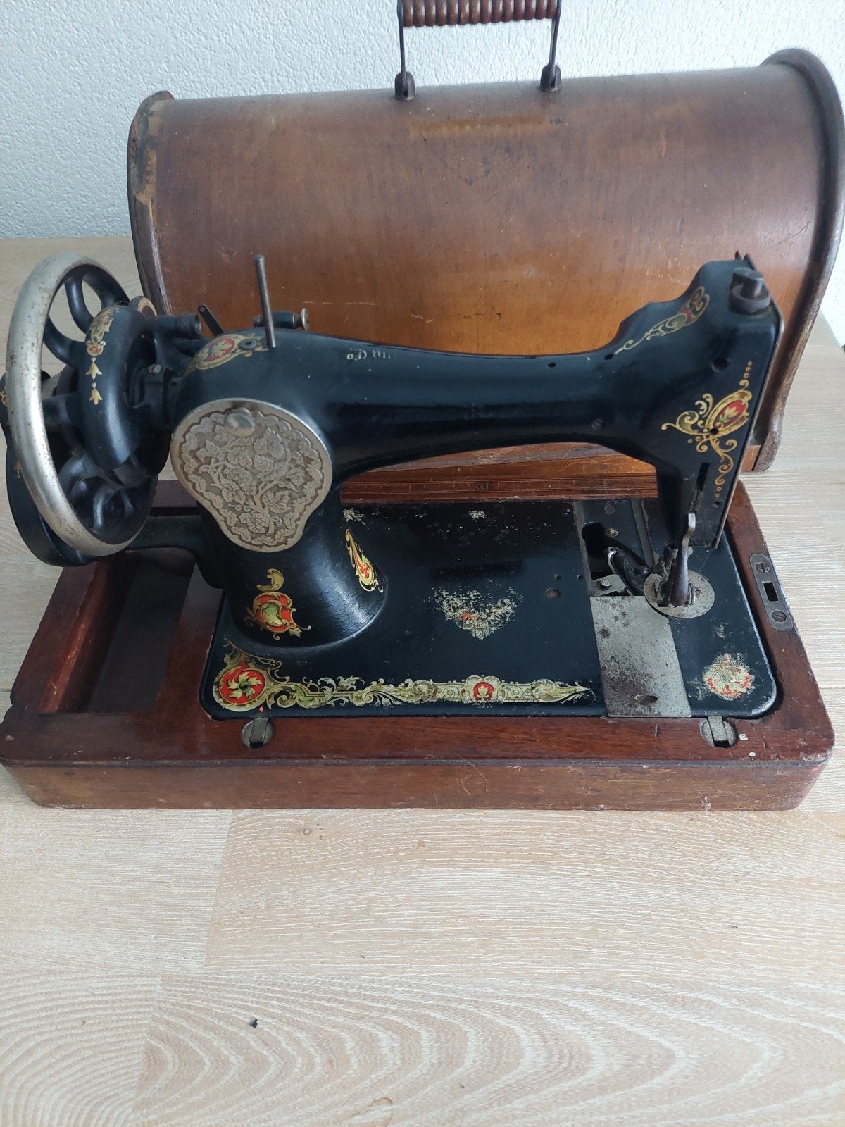 oude Singer naaimachine, Ophalen