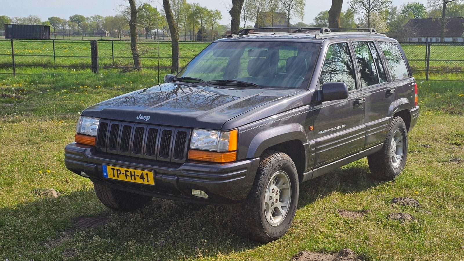 Jeep Grand Cherokee 5.2 I V8 Limited AUT 1998 Grijs, Auto's, Automaat, 5216 cc, Overige kleuren, Vierwielaandrijving