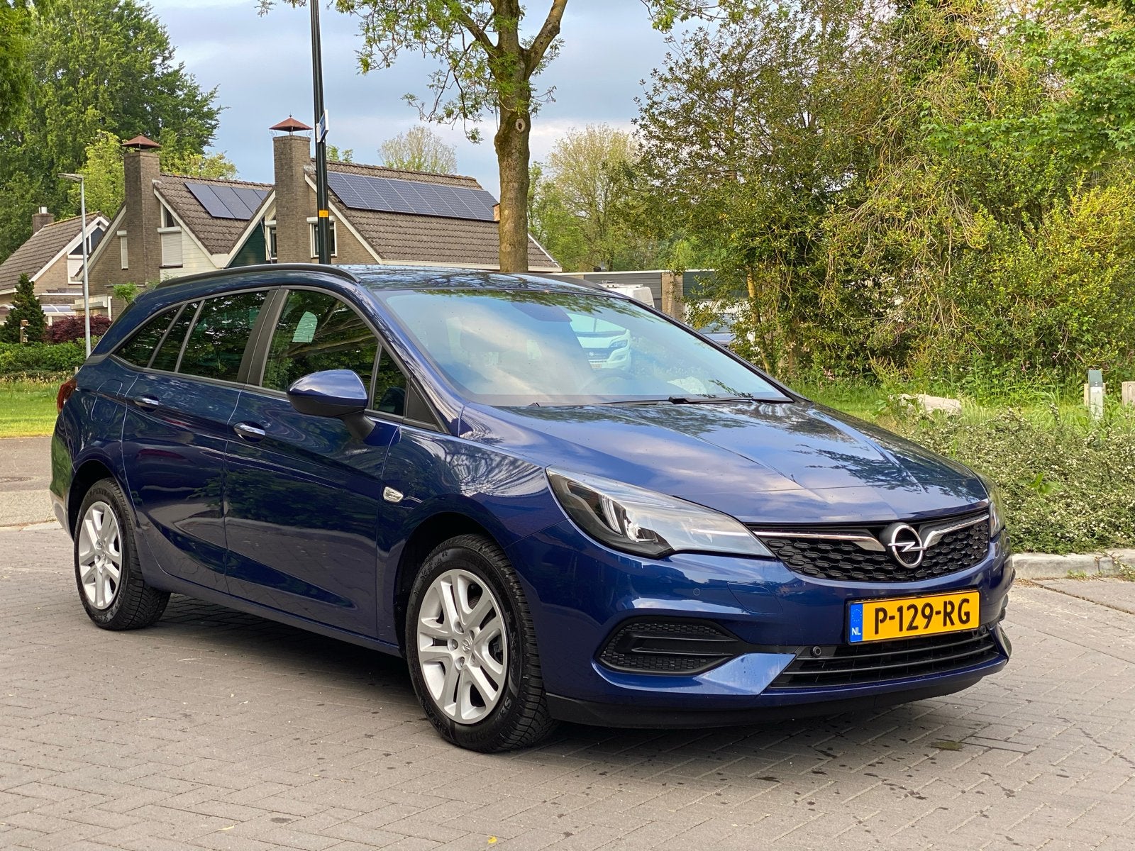 Opel Astra 1.2 Turbo 130pk Start/stop 2021 Blauw, Auto's, 1250 kg, 1199 cc, Blauw, Stationwagon