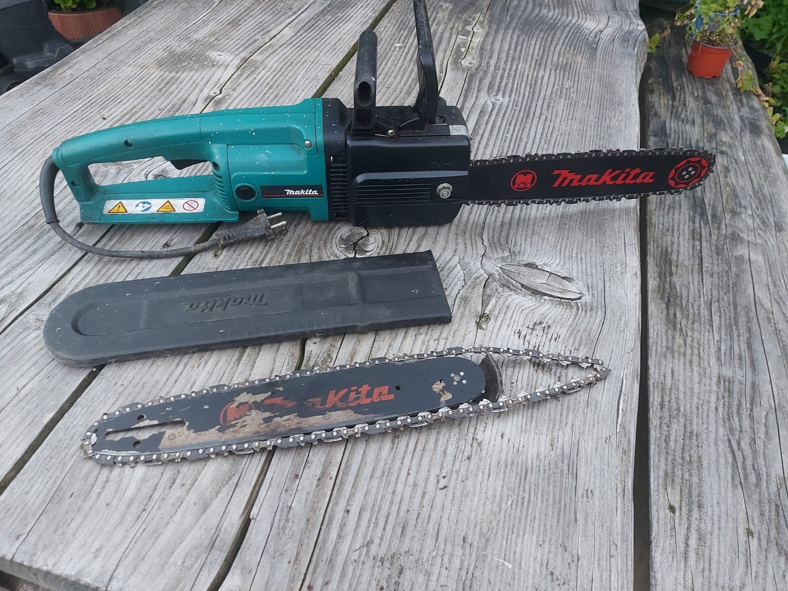 Makita UC3500A elektrische kettingzaag 1550W, Doe-het-zelf en Verbouw, Gereedschap | Zaagmachines, Ophalen, Gebruikt, 70 mm of meer