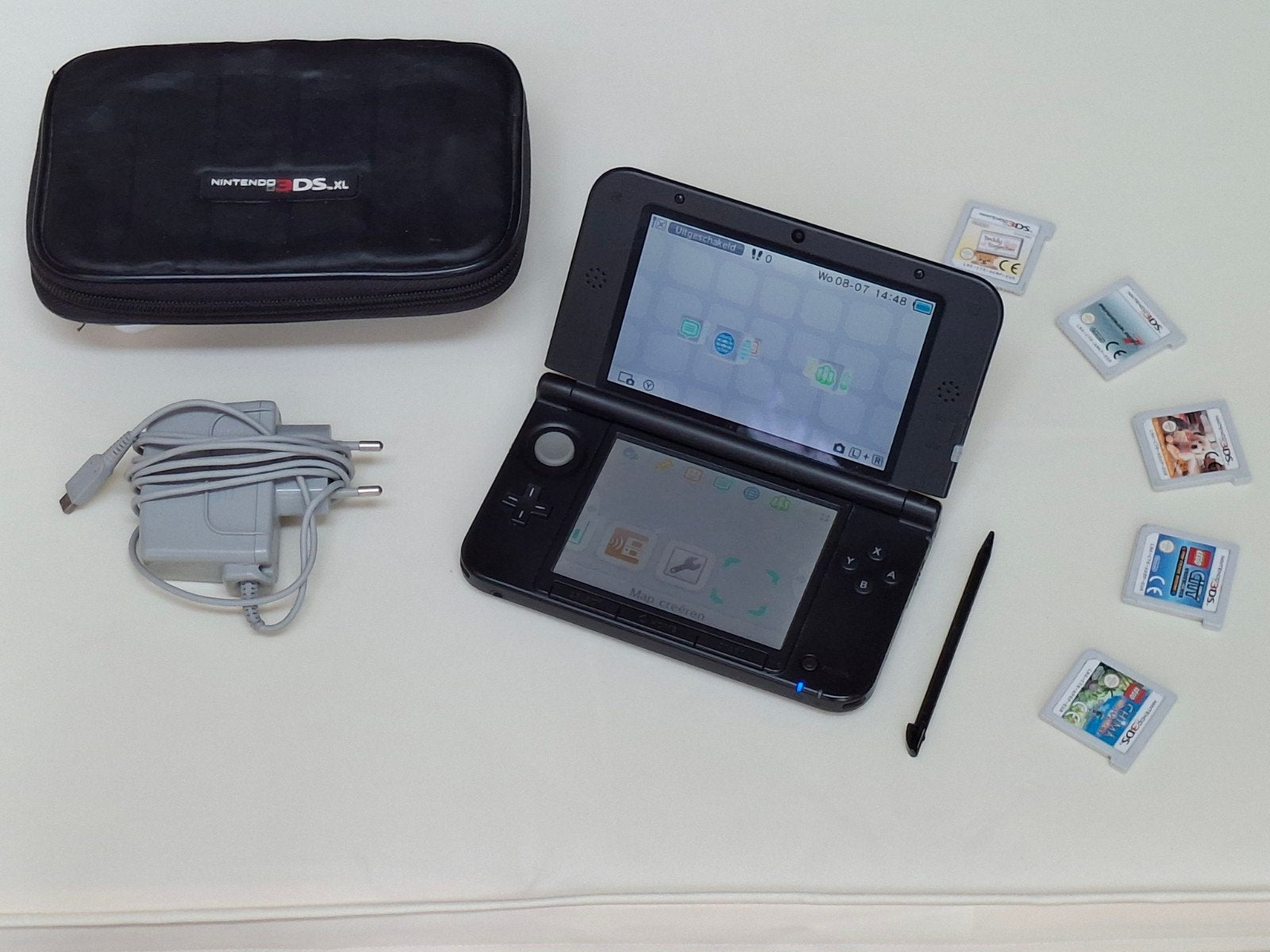 Nintendo 3DS XL_Compleet met spellen, lader en hoes., Ophalen of Verzenden, Zo goed als nieuw, Zwart, 3DS