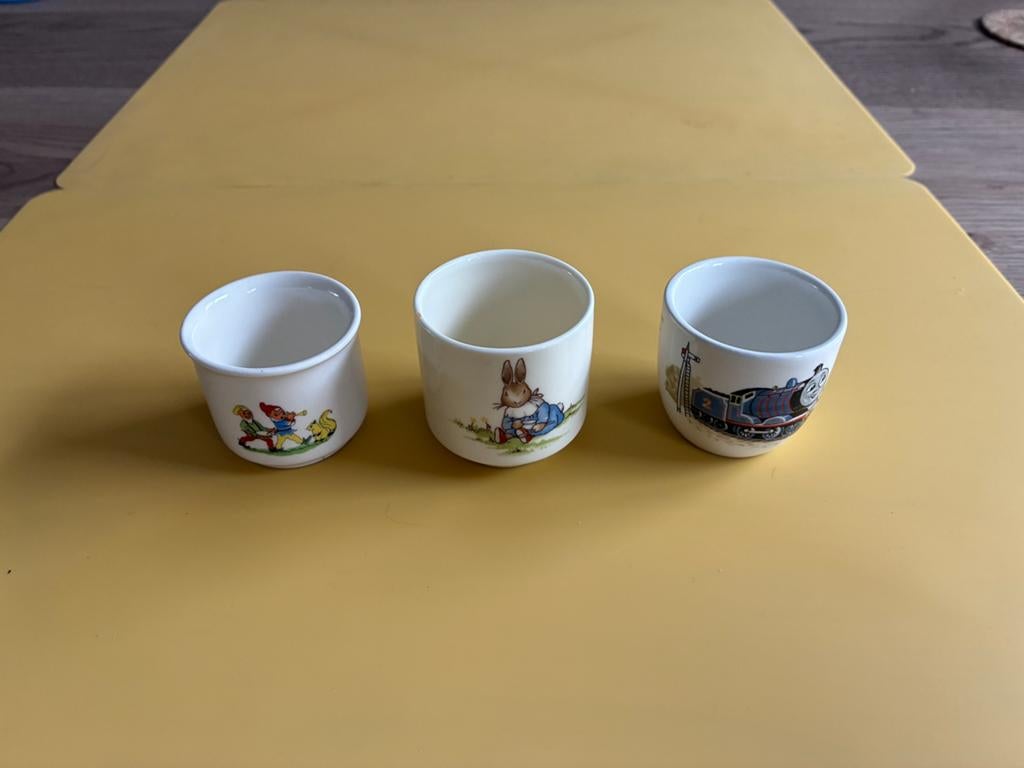 3 eierdopjes, Ophalen