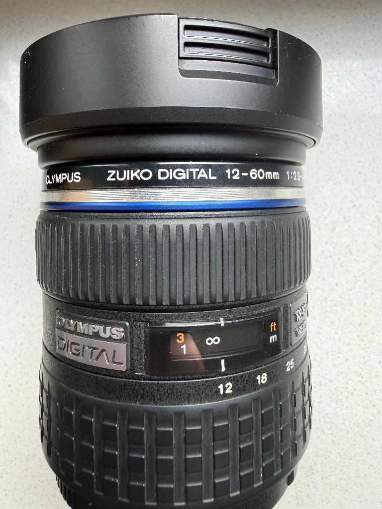 Olympus Zuiko Digital 12-60mm f/2.8-4.0 SWD, Ophalen of Verzenden, Zo goed als nieuw