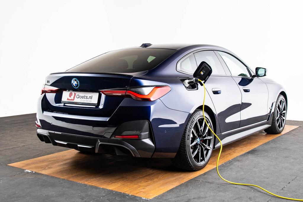 BMW i4 eDrive40 84 kWh M Sport pro - Active cruise control -, 12 maanden, Achterwielaandrijving, 590 km, Blauw