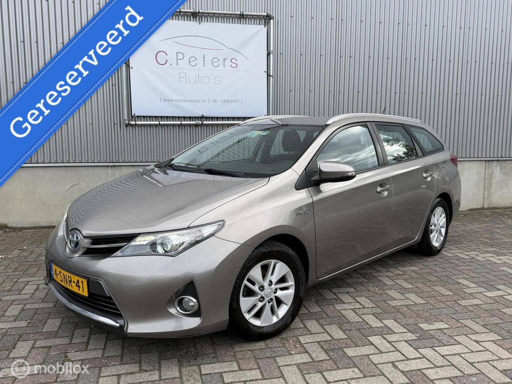 Toyota Auris 1.8 Hybrid Touring Sports Lease 2013 / Camera /, Auto's, Toyota, Gebruikt, Bruin, Origineel Nederlands, 26 km/l