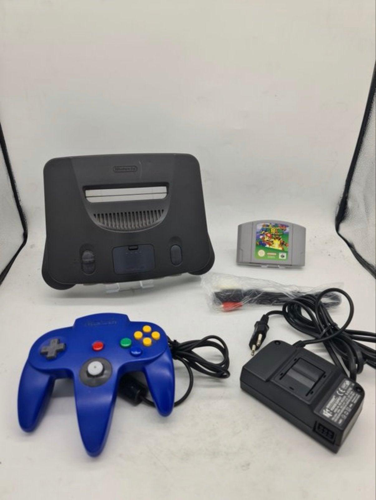 Nintendo 64 met blauwe controller en Super Mario 64, Ophalen of Verzenden, Gebruikt, Met 1 controller, Met games