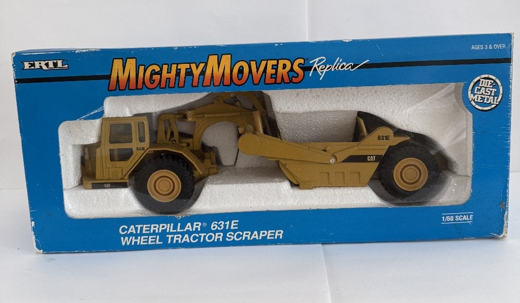 ERTL Mighty Movers2430 caterpilar631E scraper scale1.50(NRn), Ophalen, Zo goed als nieuw, Bus of Vrachtwagen, Overige merken