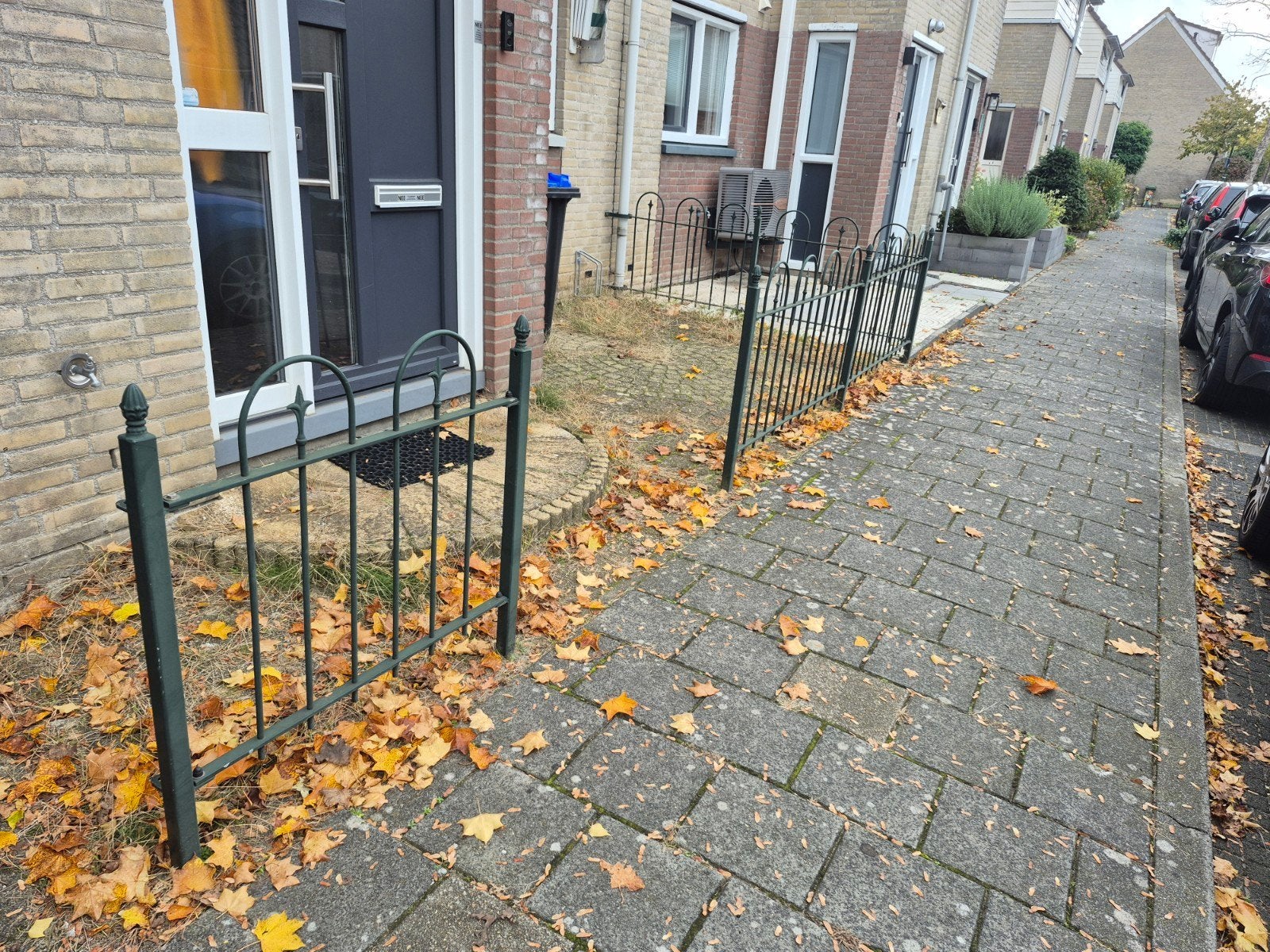 Groen ijzeren tuinhekje