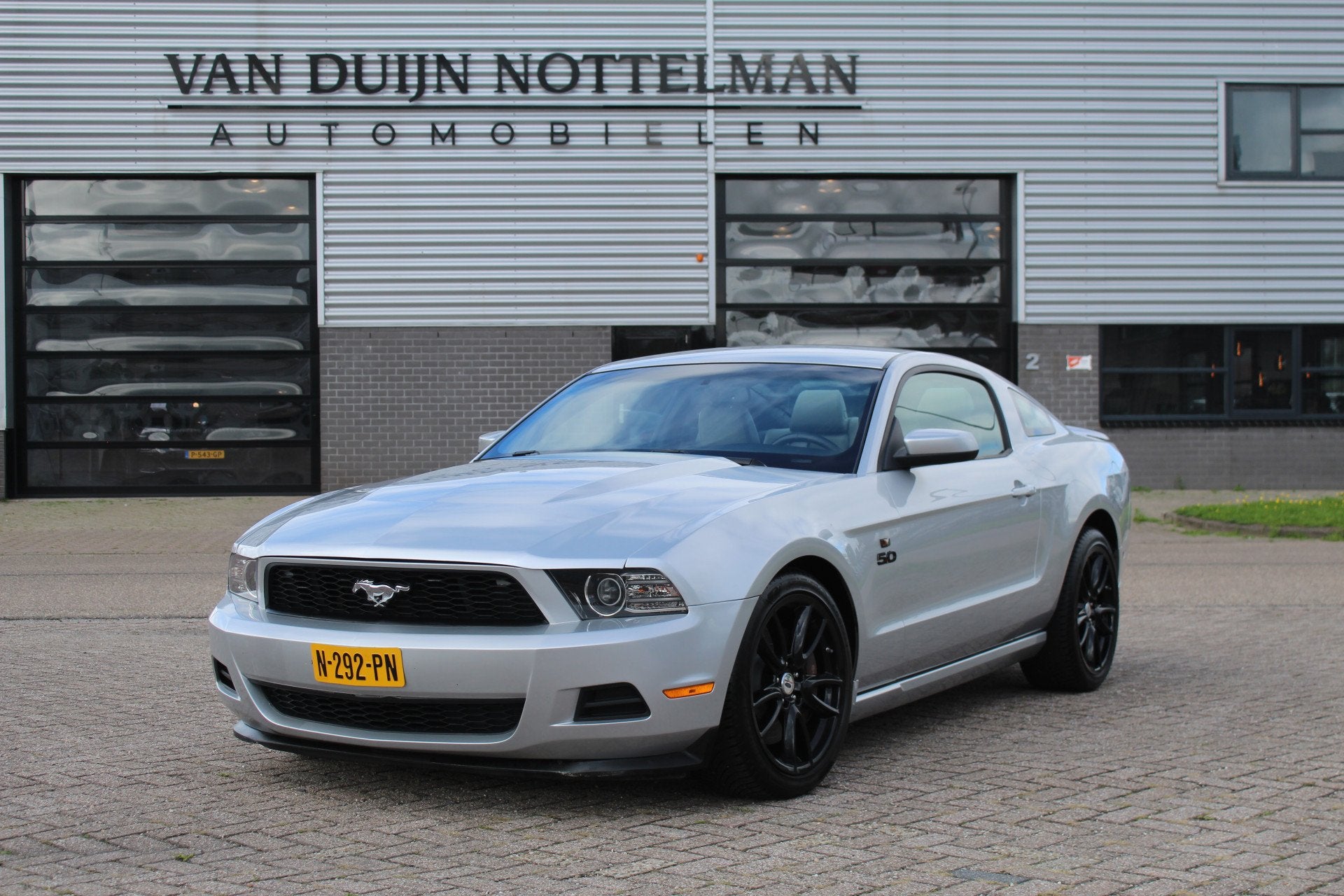 Ford USA Mustang 5.0 V8 / Handgeschakeld / Leer / Clima, Auto's, Euro 5, Met garantie (alle), 4 stoelen, 426 pk