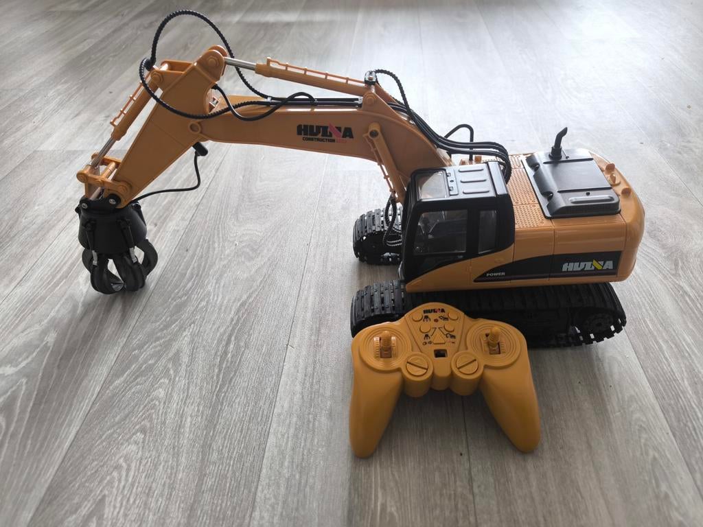 Huina graafmachine met grijper en afstandsbediening, Hobby en Vrije tijd, Ophalen of Verzenden, Groter dan 1:32, Truck, Overige merken