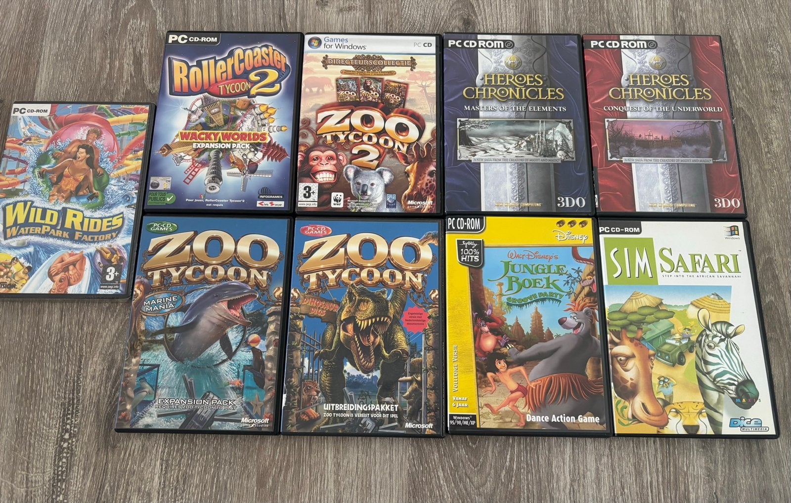 9x PC Games: RollerCoaster Tycoon, Zoo Tycoon en meer, Spelcomputers en Games, Gebruikt, 1 speler, Ophalen of Verzenden, Vanaf 3 jaar