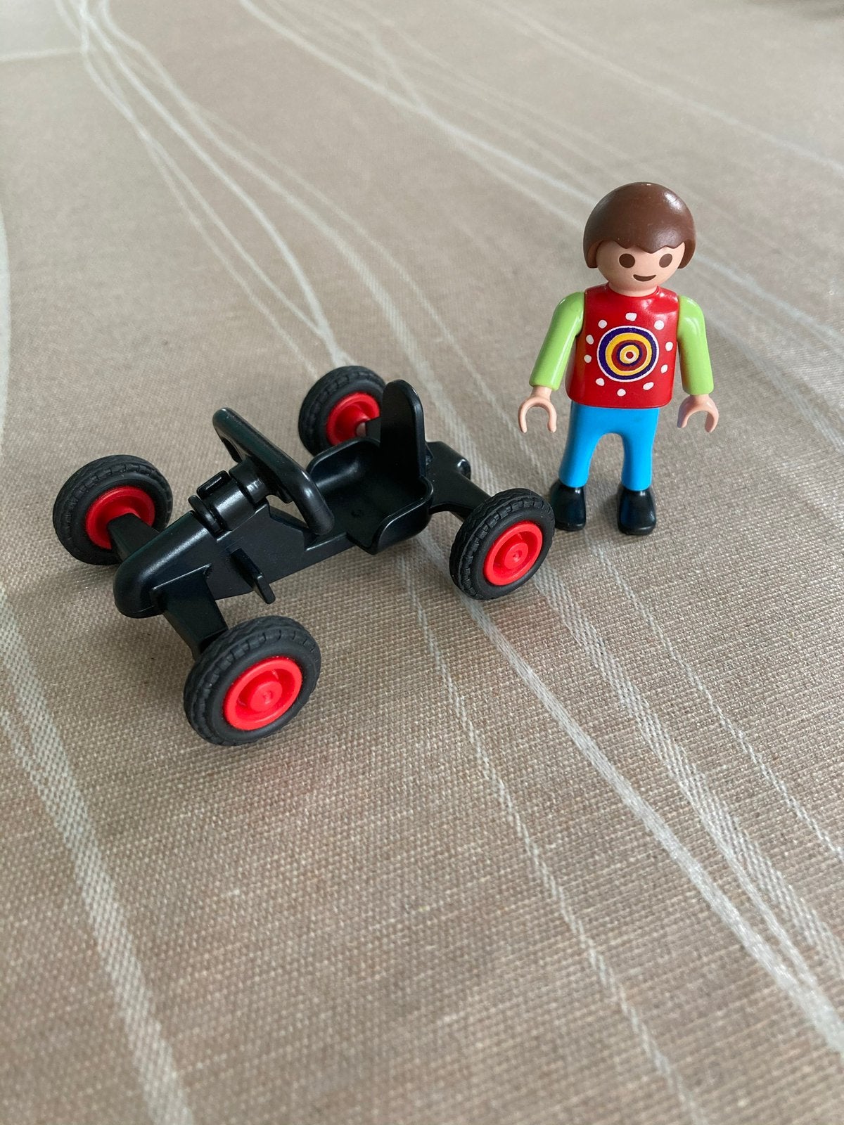 Playmobil jongen met skelter., Ophalen of Verzenden, Zo goed als nieuw